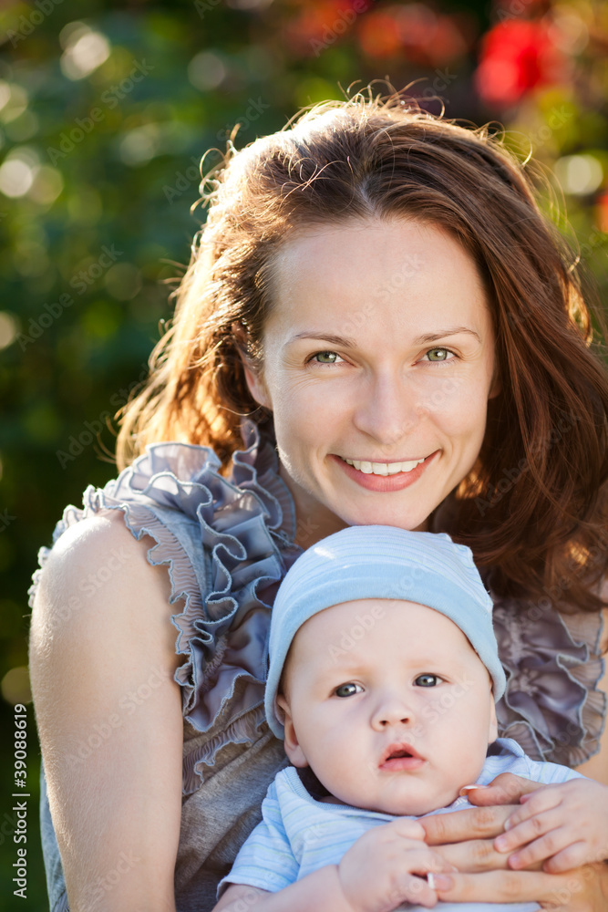 Woman and baby outdoors