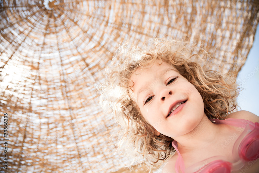 Happy child at the beach