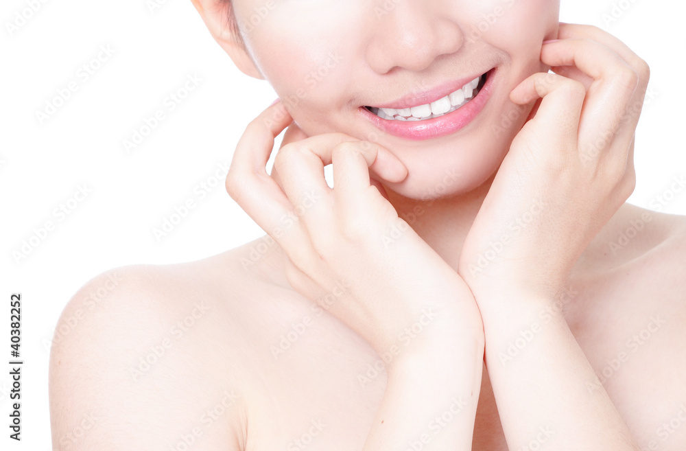 girl mouth closeup with smile and hand touch face