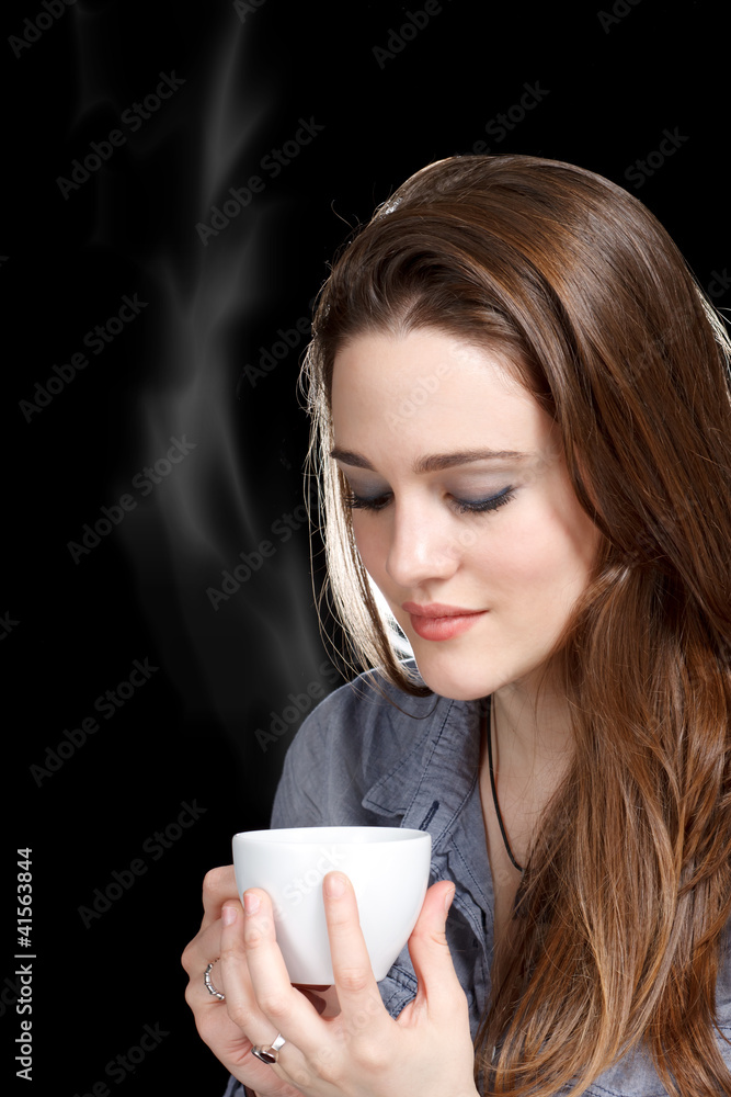 Young Woman Enjoying a Hot Beverage