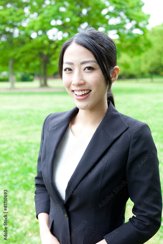 asian businesswoman in the park