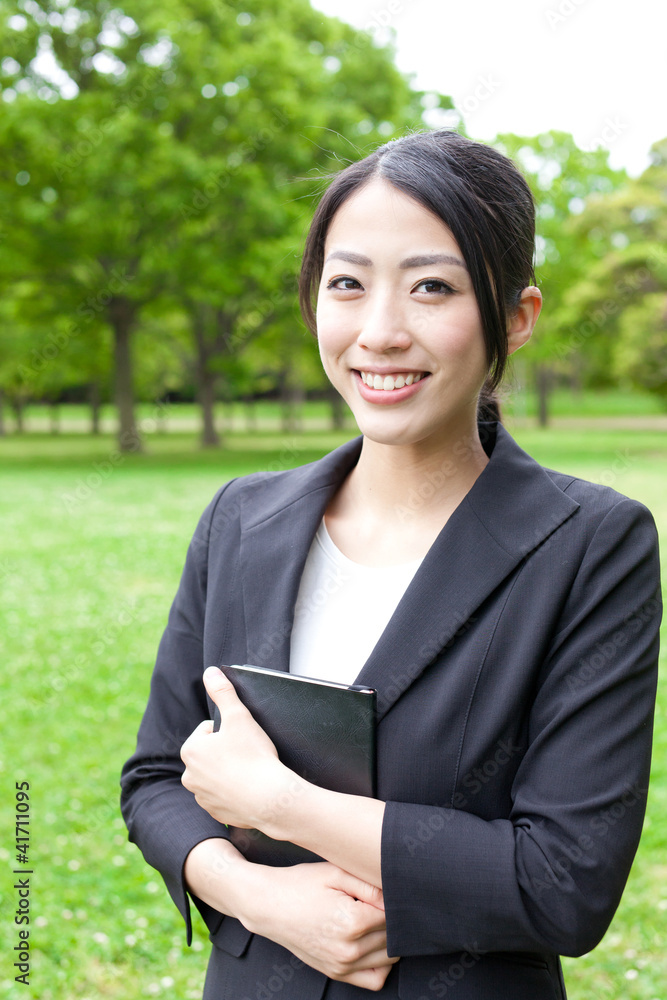 asian businesswoman in the park