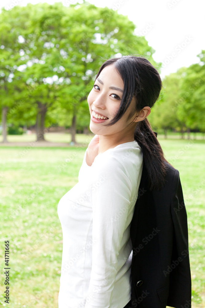 asian businesswoman in the park