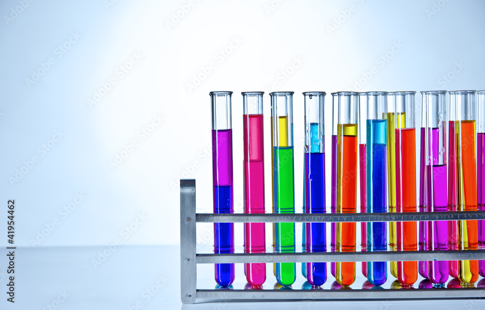 Laboratory test tubes with colored liquids inside