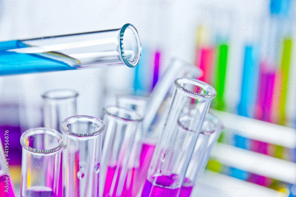 Test tubes filled with colored liquids