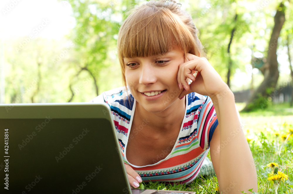 portrait of a woman witha laptop