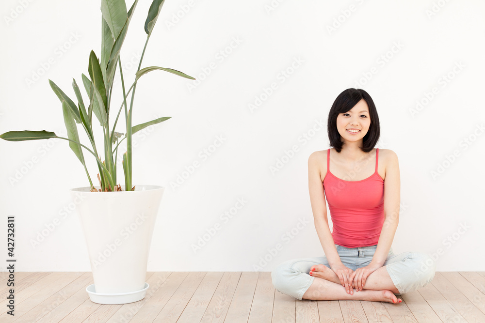 a young asian woman exercising