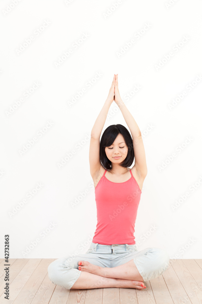 a young asian woman exercising