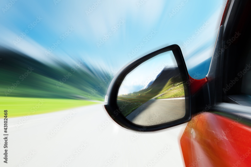 Car mirror detail, concept of speed