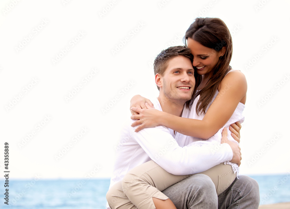 Handsome Guy Enjoying the Beach with His Girlfriend