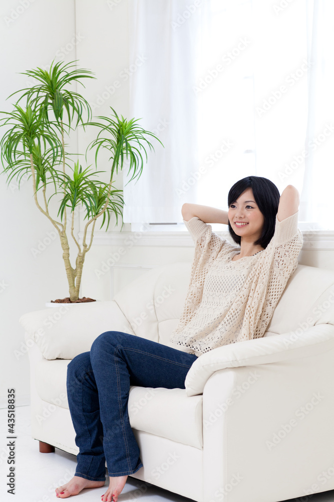 a young asian woman relaxing