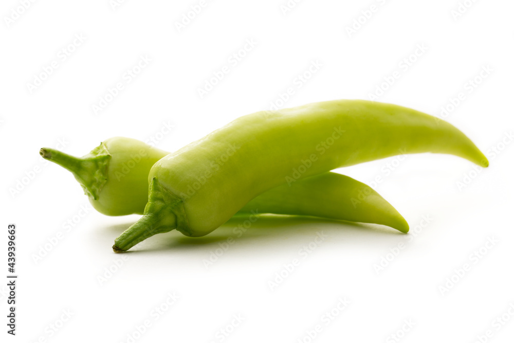 Green paprika on white background