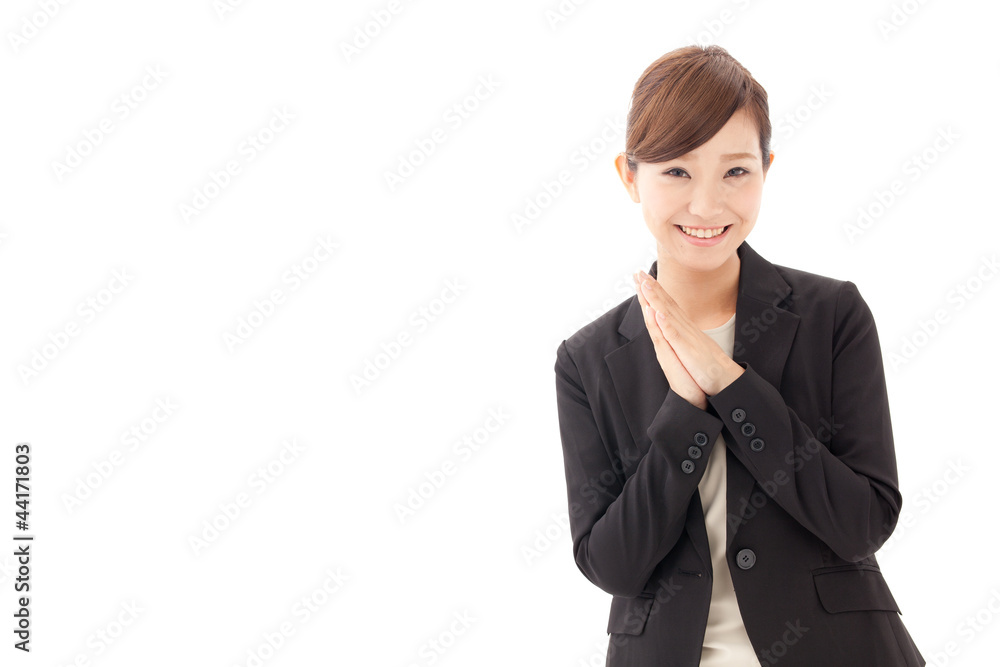 a young businesswoman smiling on white background