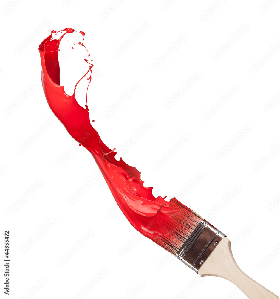 Red paint splashing out of brush. Isolated on white background