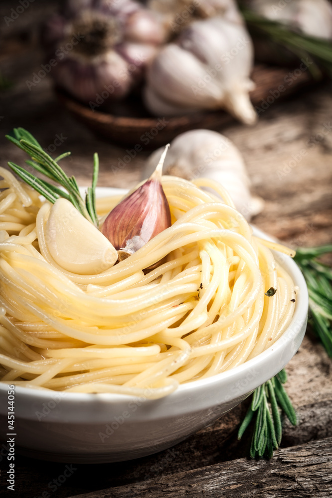 spaghetti with garlic and rosemary. Vegetarian food.