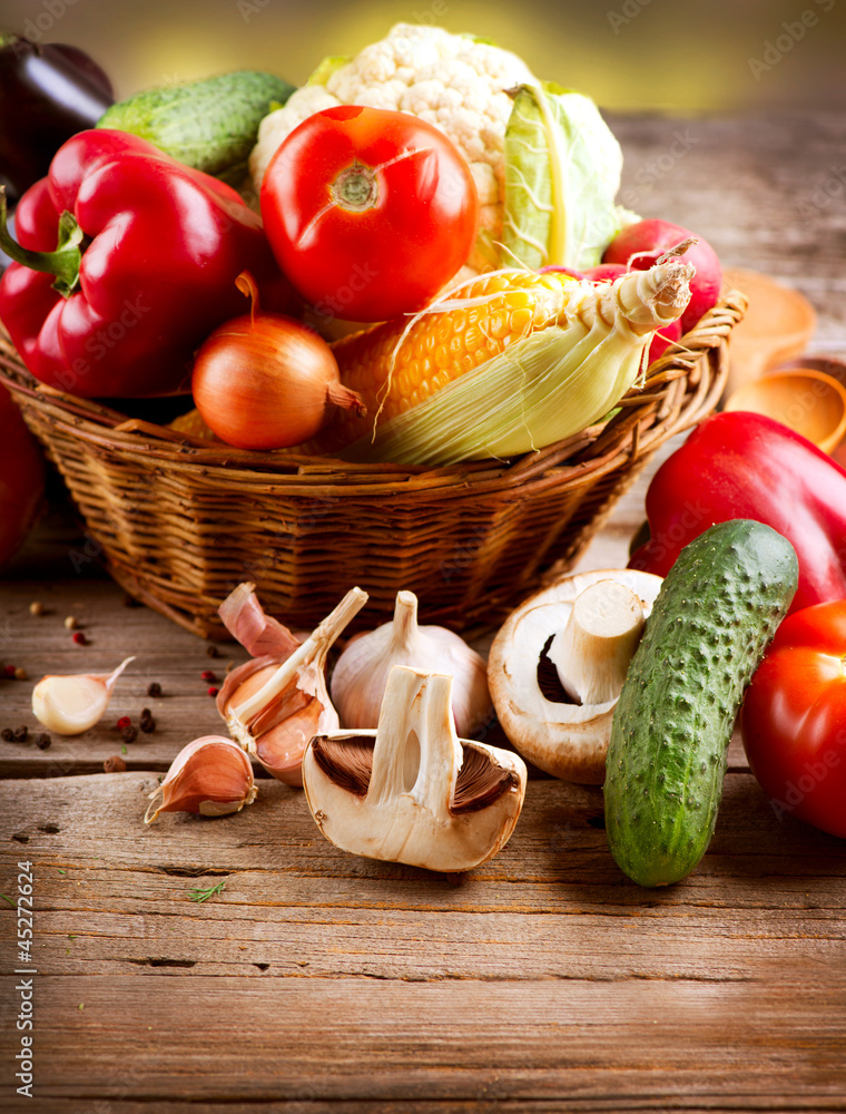 Healthy Organic Vegetables on a Wood Background