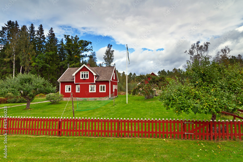 Traditional red Swedish cottage house