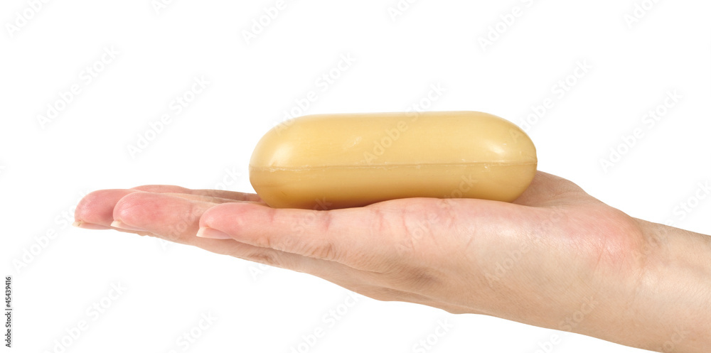 Woman hand with soap. Isolated on white background