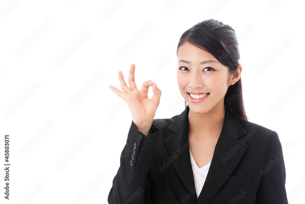 asian businesswoman showing okay sign on white background