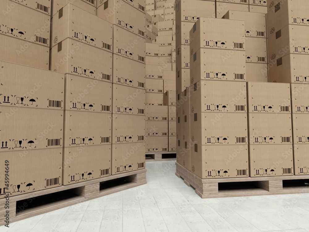 Cardboard boxes on wooden paletts, inside the warehouse