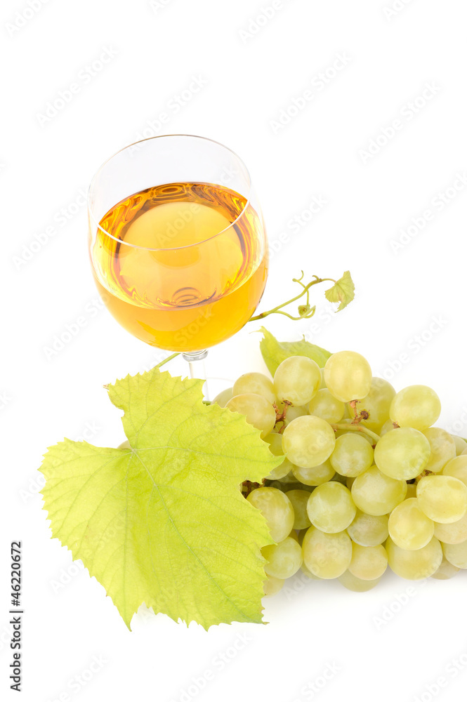 Branch of grapes and glass of wine