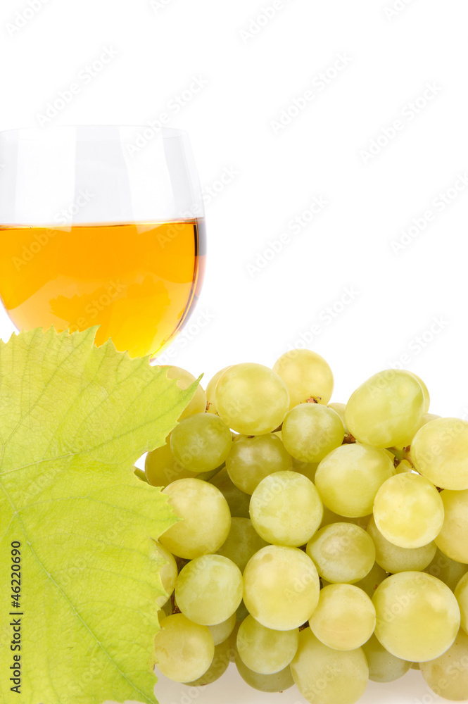 Branch of grapes and glass of wine