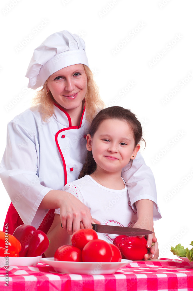 Mother and daughter cooking dinner