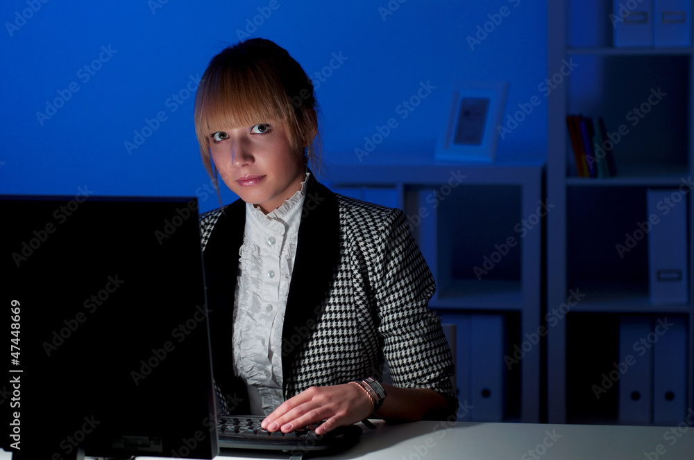 women working in the office at night