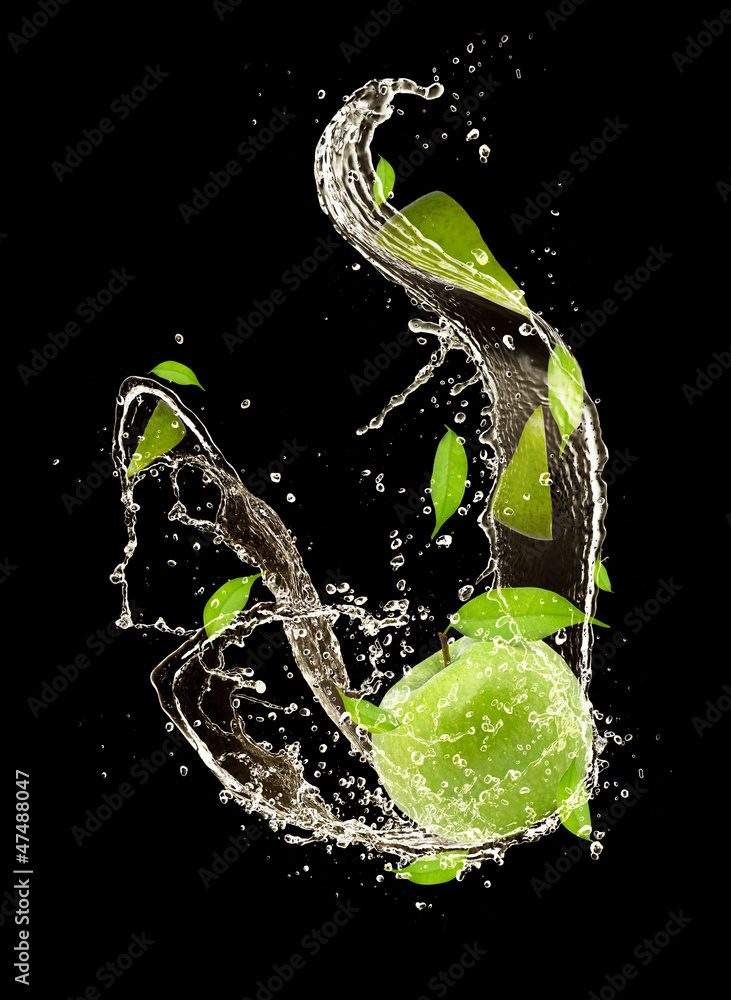  Fresh apples falling in water splash, on black background