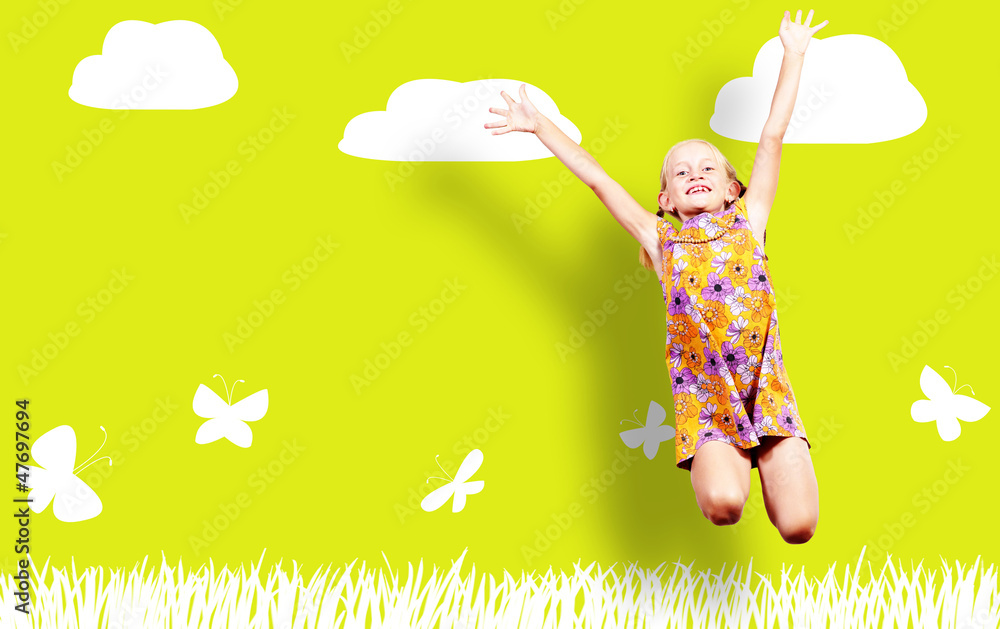 Girl jumping in a color dress on paint wall