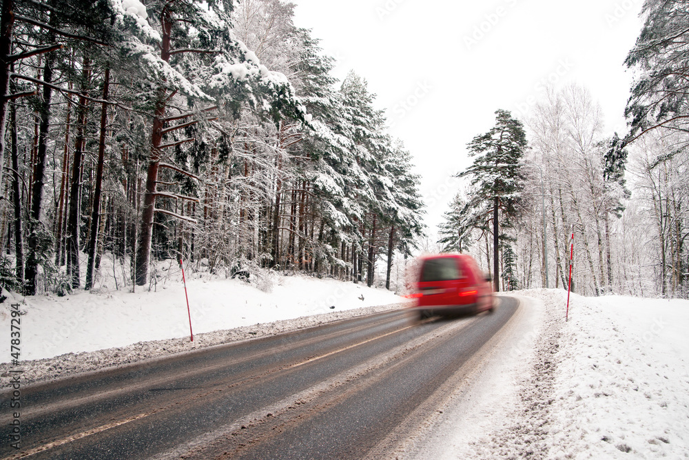 Red van on winter road