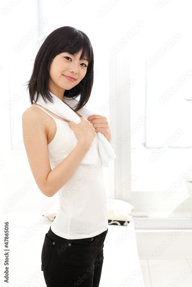 attractive asian woman relaxing in the room