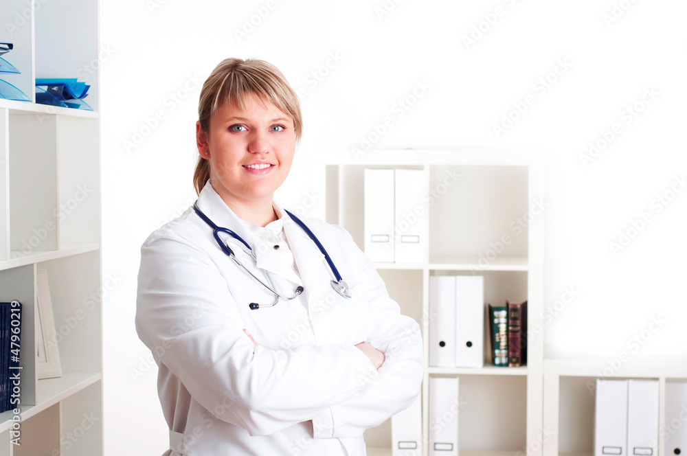 Smiling medical doctor woman with stethoscope.