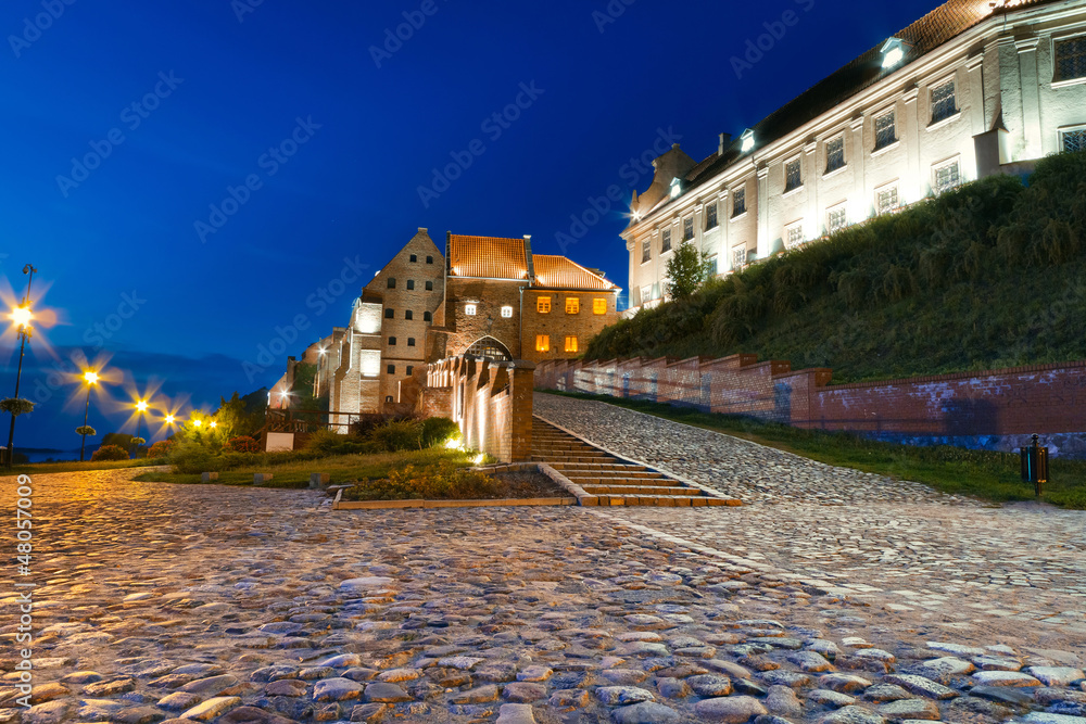 Granaries with water gate in Grudziadz at night, Poland