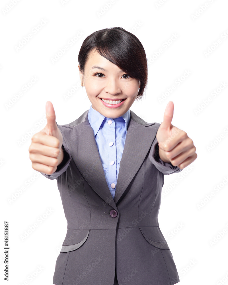 Happy business woman with thumbs up