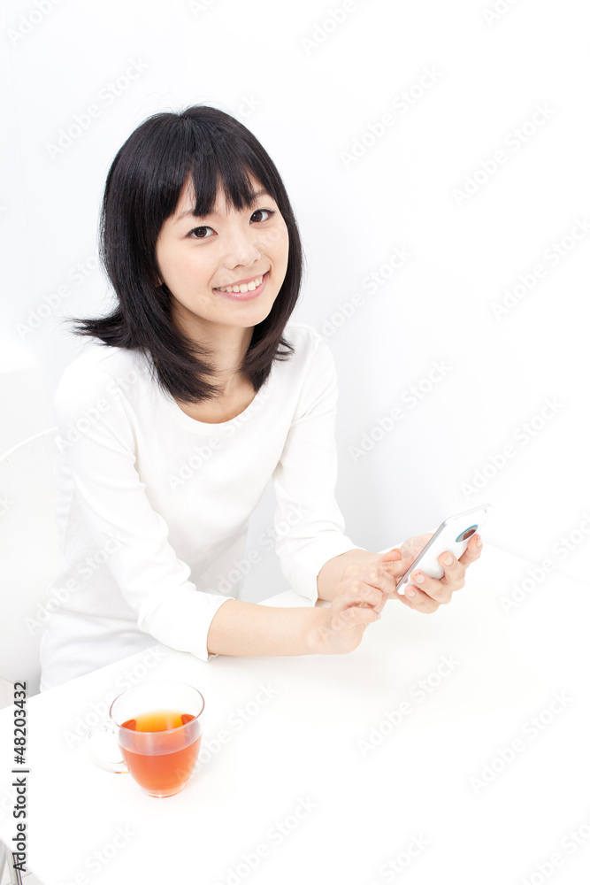 attractive asian woman using smart phone