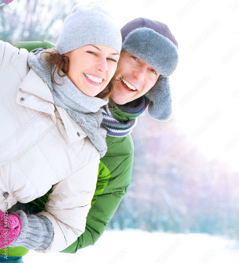 Happy Couple Having Fun Outdoors. Snow. Winter Vacation