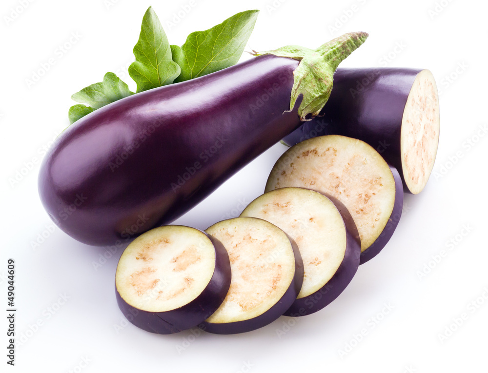 aubergine with leaves isolated on white