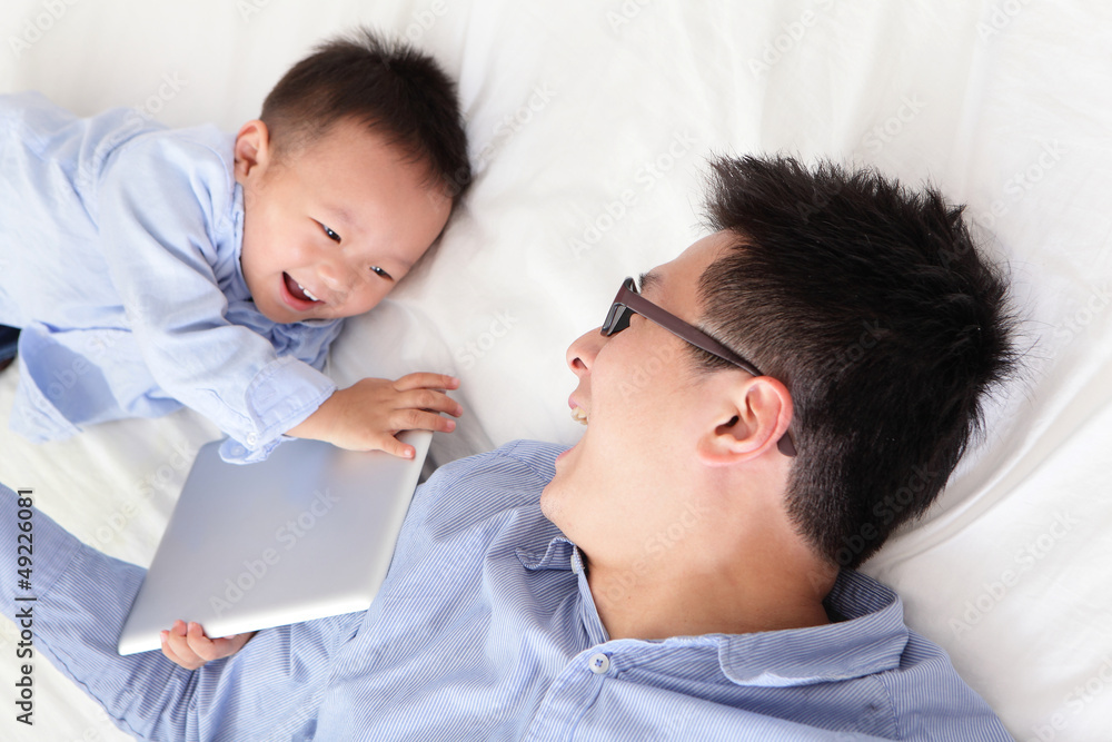 happy family using tablet pc