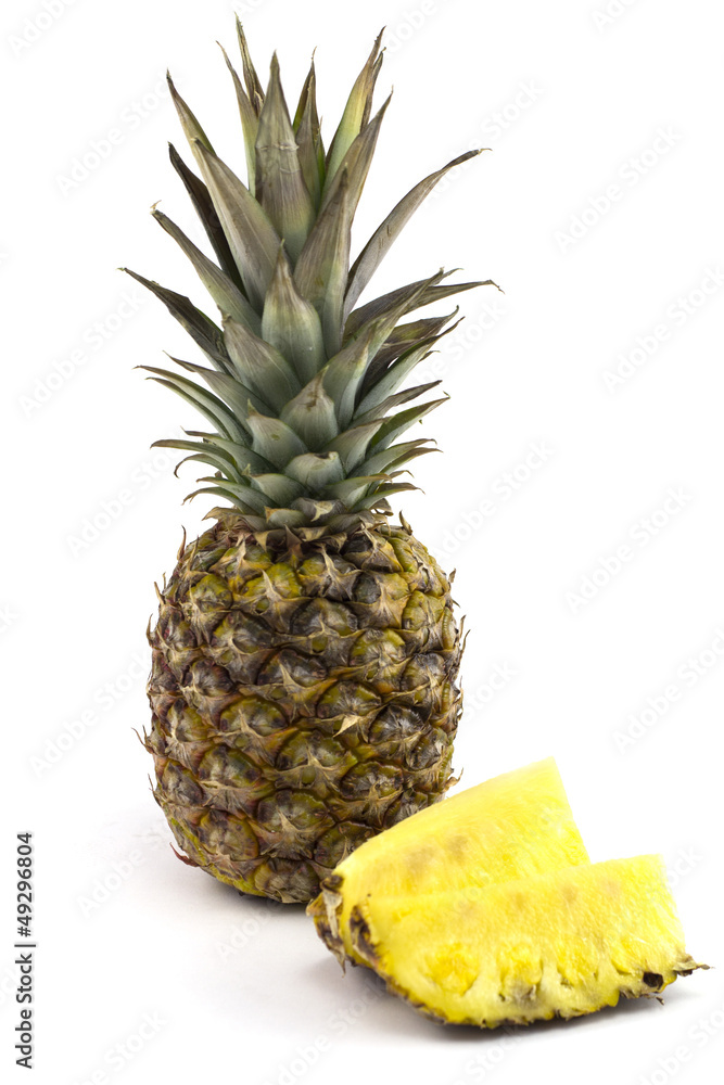 pineapple with slices isolated on white