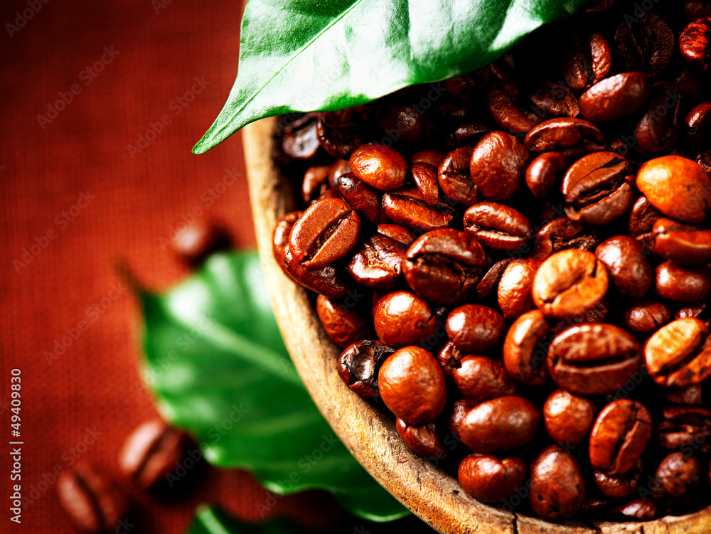 Coffee beans. Bowl of Aromatic Coffee close-up