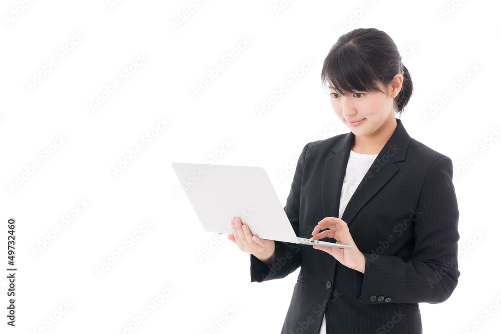 a young businesswoman using laptop