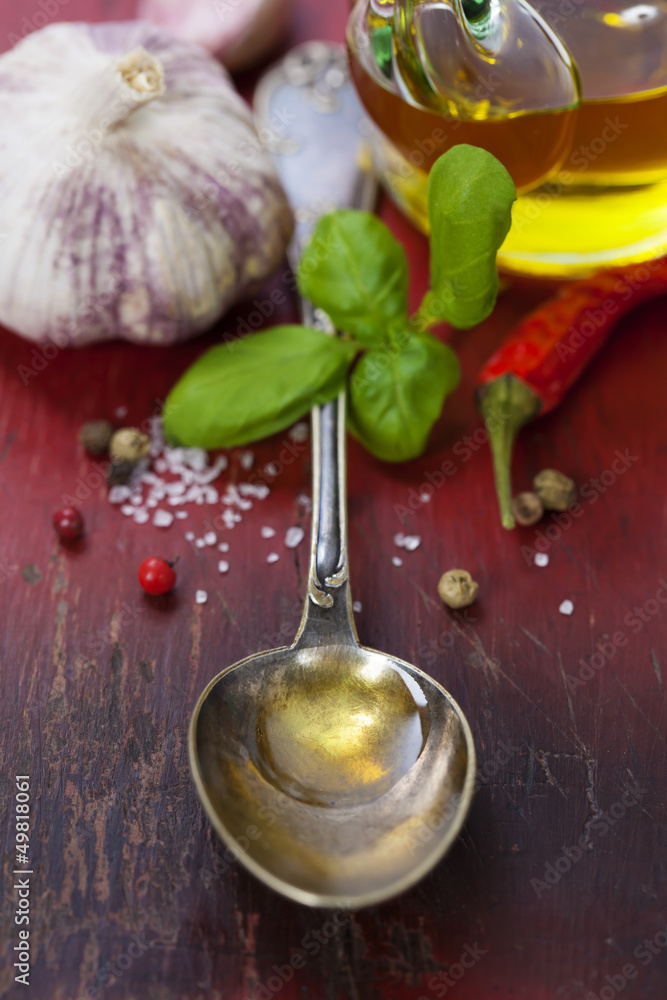 Spoon with Olive Oil and vegetables