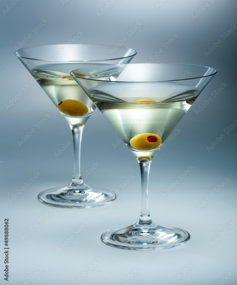 two glasses martini with olive. cocktail isolated