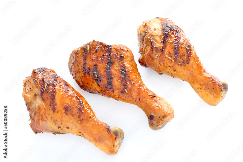 Grilled chicken leg on white background.