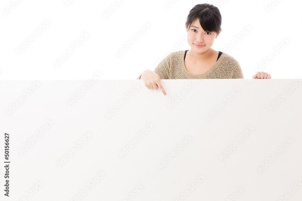 a young asian woman with blank whiteboard