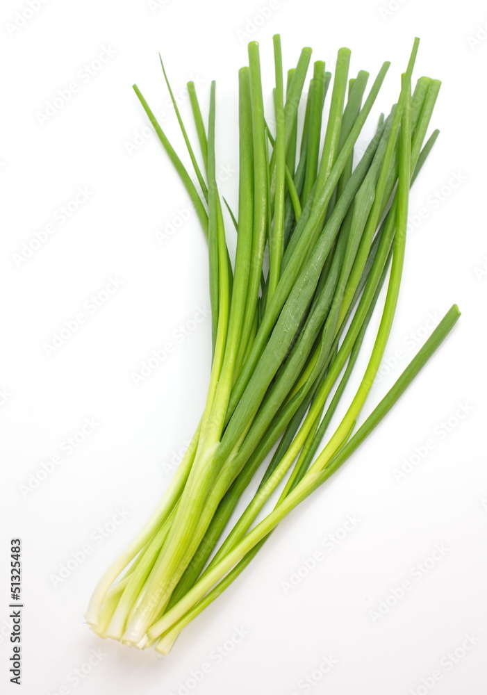 beautiful spring onions on a white background