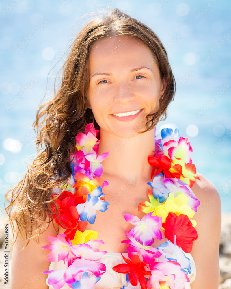 Woman with hawaiian flowers garland