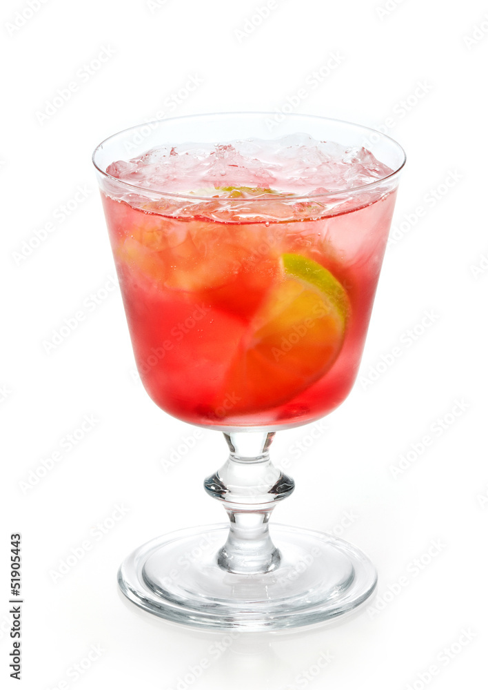 red cold drink with ice and lime