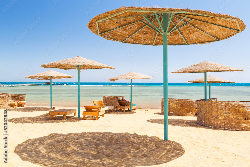 Relax under parasol on the beach of Red Sea, Egypt